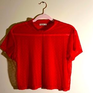 Sheer red top.